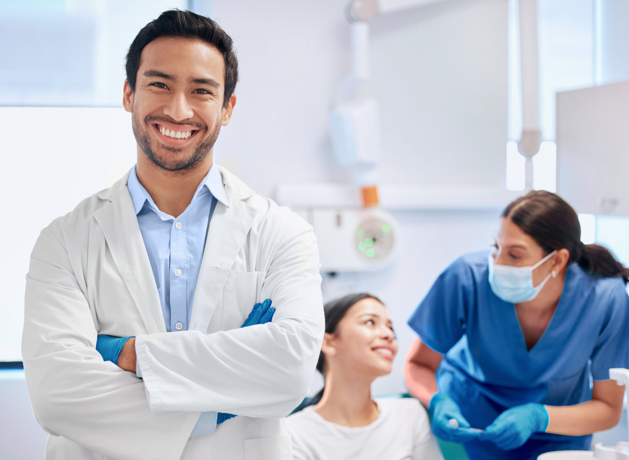 portrait-dentist-nurse-oral-health-dental-care-hygiene-office-consultation-clinic-man-arms-crossed-smile-as-medic-doctor-hospital-treatment-teeth-mouth-scaled.jpg
